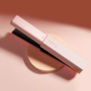 مكواة فرد الشعر المحمولة